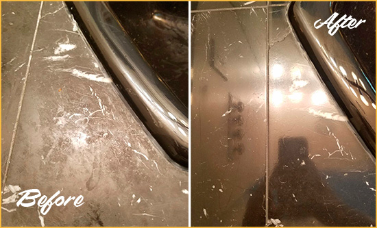 Before and After Picture of a Marvin Marble Tub Stone Sealed to Remove Stains