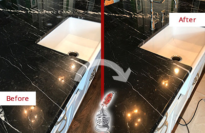 Before and After Picture of a Black Marble Countertop Cleaned and Sealed to Remove Water Marks